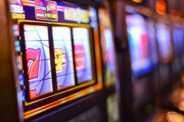 Diamond Empire slot game interface showing gem symbols and payline layout